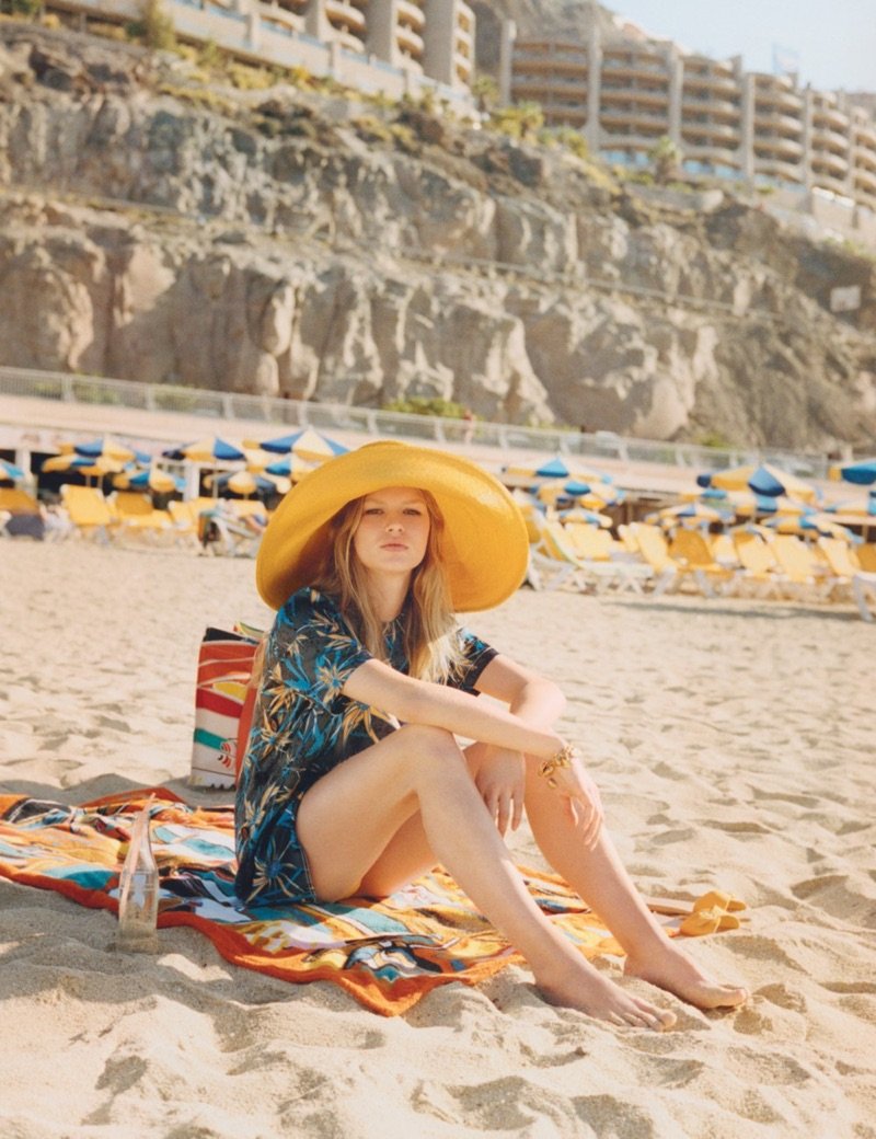 In the sand, Anna Ewers poses in Marni top, Albertus Swanepoel hat and Ancient Greek Sandals