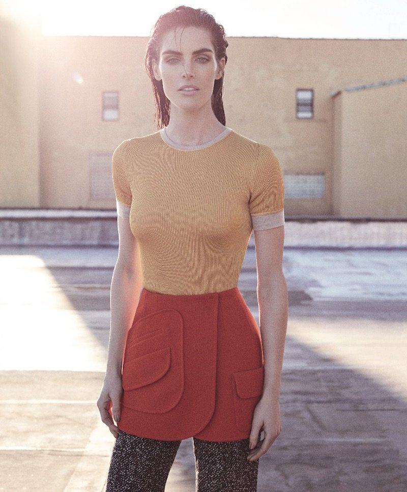 Taking on color-blocking, Hilary Rhoda poses in Dior, top, skirt and pants