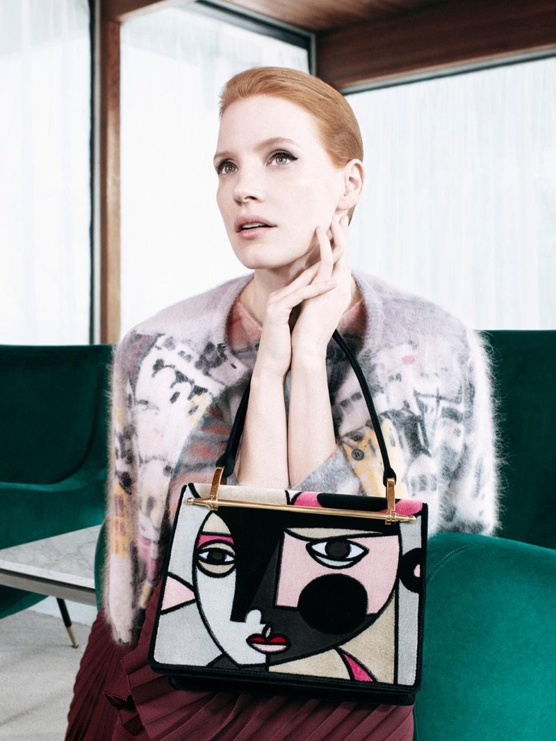 Jessica Chastain poses with graphic print bag in Prada's pre-fall 2017 campaign