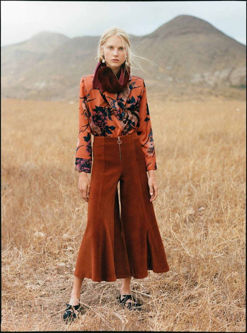 Model wears Zara printed sateen bodysuit, pearly earrings, shawl with textured detail and knotted high heel slingbacks