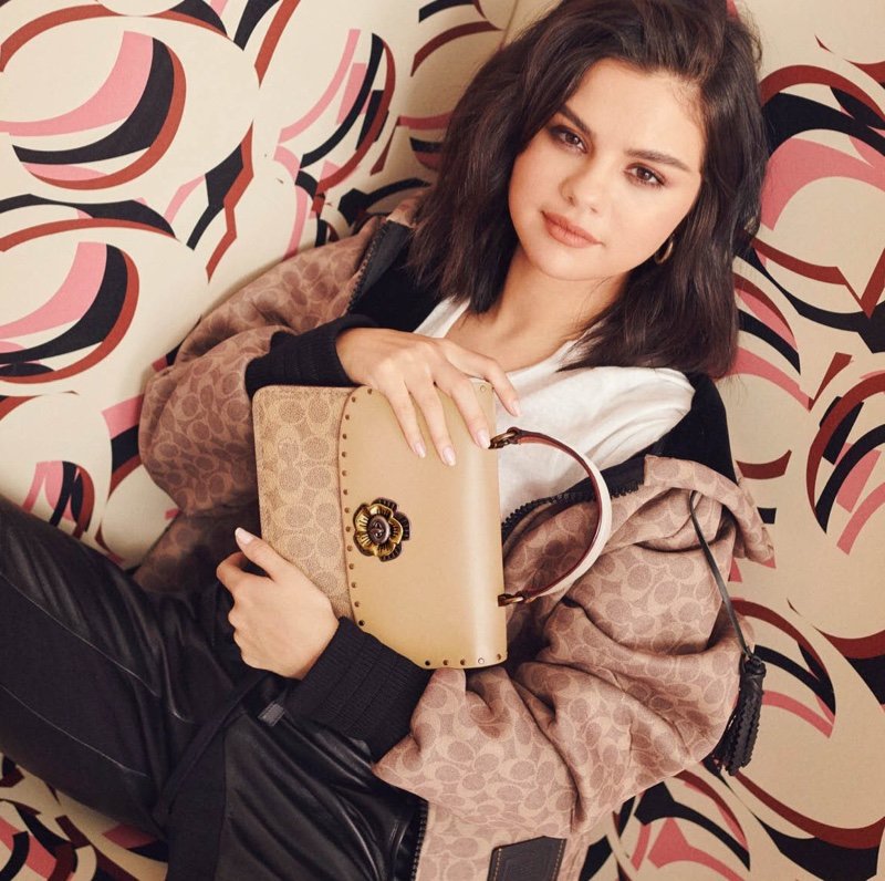 Selena Gomez wears Coach Parker bag with signature canvas print